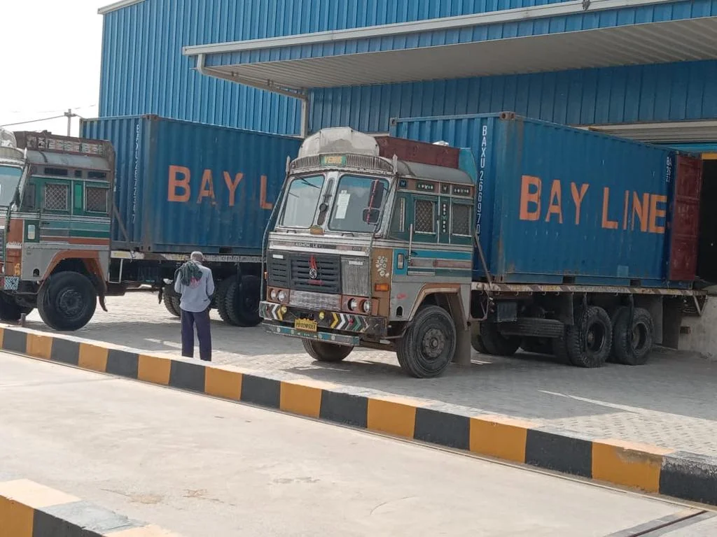 Export trucks at the facility